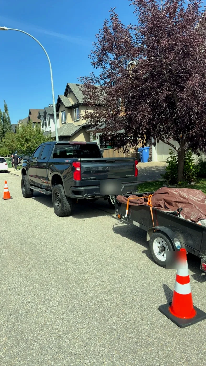 Edge Property Services truck and trailer used for project cleanup and haul-away